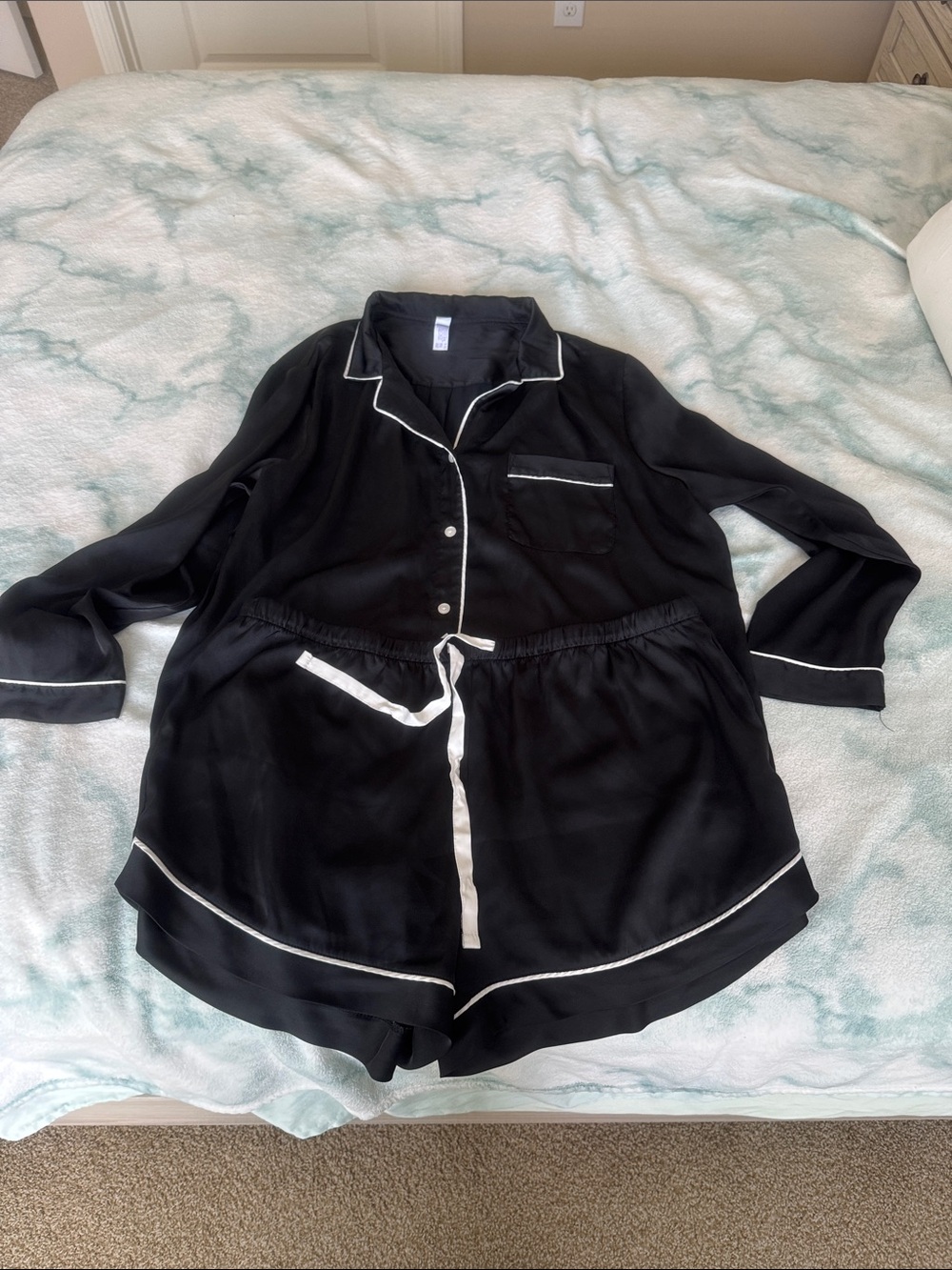 stars above Black Pajama Set with White Trim
